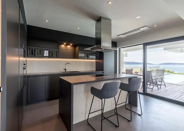 Beachfront With Heated Infinity Pool And Direct Sea Access Near Split