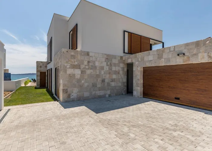 Beachfront With Heated Infinity Pool And Direct Sea Access Near Split *